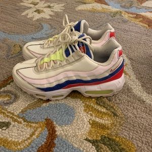 white, pink, blue, and red air max 95